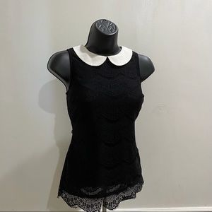Black lace sleeveless top with white Peter Pan collar
